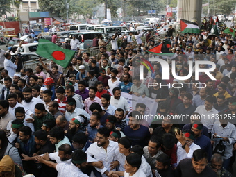 Activists of the Jatiya Nagarik Committee stage a protest rally against the attack on the Bangladesh Assistant High Commission in Agartala a...