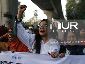 Activists of the Jatiya Nagarik Committee stage a protest rally against the attack on the Bangladesh Assistant High Commission in Agartala a...