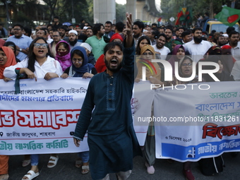 Activists of the Jatiya Nagarik Committee stage a protest rally against the attack on the Bangladesh Assistant High Commission in Agartala a...