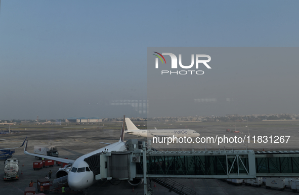 An IndiGo Airlines aircraft taxis on the tarmac at the Netaji Subhash Chandra Bose International Airport in Kolkata, India, on December 3, 2...