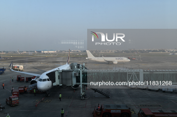 An IndiGo Airlines aircraft taxis on the tarmac at the Netaji Subhash Chandra Bose International Airport in Kolkata, India, on December 3, 2...