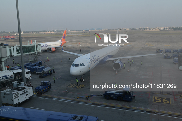 An IndiGo Airlines aircraft taxis on the tarmac at the Netaji Subhash Chandra Bose International Airport in Kolkata, India, on December 3, 2...