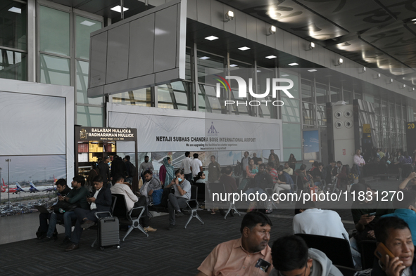 Passengers wait for their flights at the Netaji Subhash Chandra Bose International Airport in Kolkata, India, on December 3, 2024. 