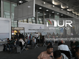 Passengers wait for their flights at the Netaji Subhash Chandra Bose International Airport in Kolkata, India, on December 3, 2024. (