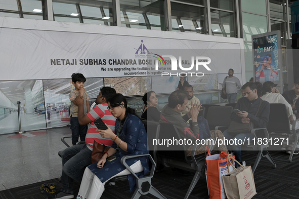 Passengers wait for their flights at the Netaji Subhash Chandra Bose International Airport in Kolkata, India, on December 3, 2024. 