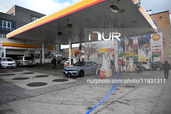 Two men are stabbed during an attempted robbery of a vehicle at a Shell gas station in the Sunset Park section of Brooklyn, New York, United...