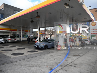 Two men are stabbed during an attempted robbery of a vehicle at a Shell gas station in the Sunset Park section of Brooklyn, New York, United...