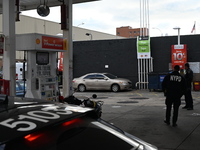 Two men are stabbed during an attempted robbery of a vehicle at a Shell gas station in the Sunset Park section of Brooklyn, New York, United...