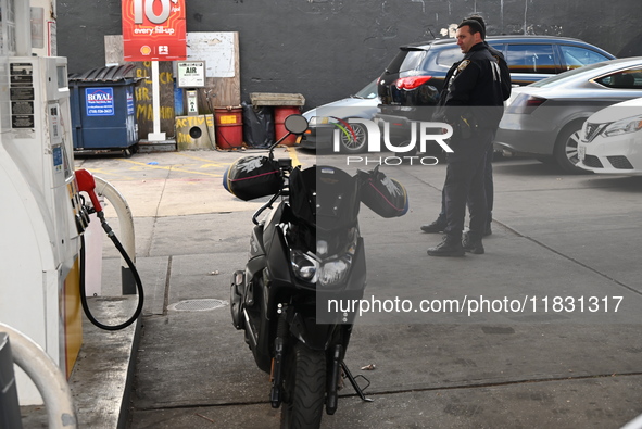 Two men are stabbed during an attempted robbery of a vehicle at a Shell gas station in the Sunset Park section of Brooklyn, New York, United...