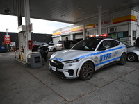 Two men are stabbed during an attempted robbery of a vehicle at a Shell gas station in the Sunset Park section of Brooklyn, New York, United...