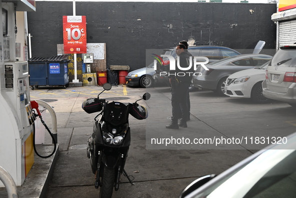 Two men are stabbed during an attempted robbery of a vehicle at a Shell gas station in the Sunset Park section of Brooklyn, New York, United...