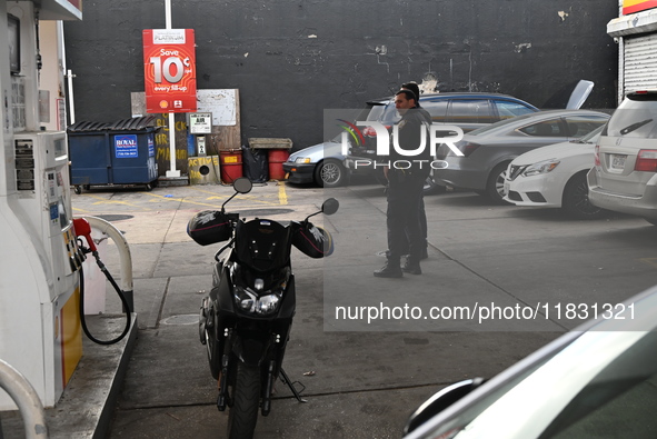 Two men are stabbed during an attempted robbery of a vehicle at a Shell gas station in the Sunset Park section of Brooklyn, New York, United...