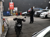 Two men are stabbed during an attempted robbery of a vehicle at a Shell gas station in the Sunset Park section of Brooklyn, New York, United...