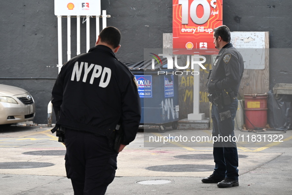 Two men are stabbed during an attempted robbery of a vehicle at a Shell gas station in the Sunset Park section of Brooklyn, New York, United...