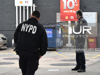 Two men are stabbed during an attempted robbery of a vehicle at a Shell gas station in the Sunset Park section of Brooklyn, New York, United...