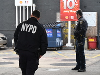 Two men are stabbed during an attempted robbery of a vehicle at a Shell gas station in the Sunset Park section of Brooklyn, New York, United...