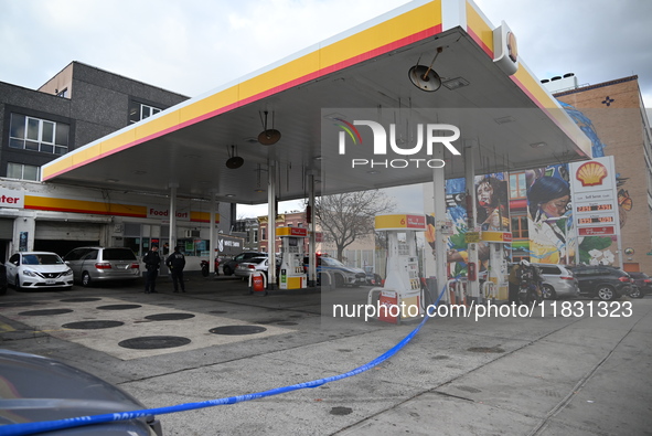 Two men are stabbed during an attempted robbery of a vehicle at a Shell gas station in the Sunset Park section of Brooklyn, New York, United...