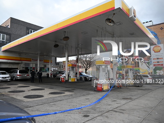 Two men are stabbed during an attempted robbery of a vehicle at a Shell gas station in the Sunset Park section of Brooklyn, New York, United...