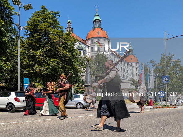 In Neuburg an der Donau, Germany, on July 9, 2023, the city hosts a grand historical parade as part of its annual castle festival. Around 2,...