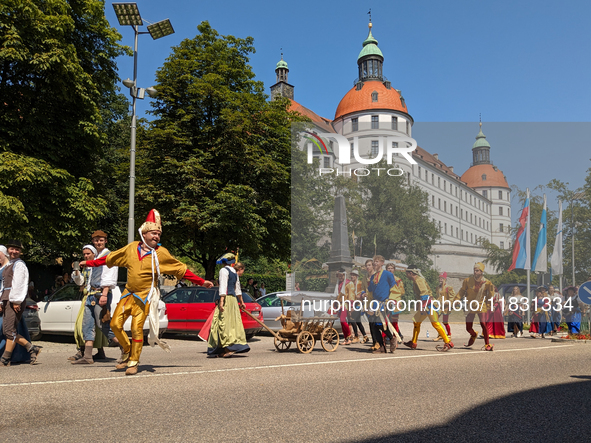 In Neuburg an der Donau, Germany, on July 9, 2023, the city hosts a grand historical parade as part of its annual castle festival. Around 2,...