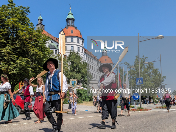 In Neuburg an der Donau, Germany, on July 9, 2023, the city hosts a grand historical parade as part of its annual castle festival. Around 2,...