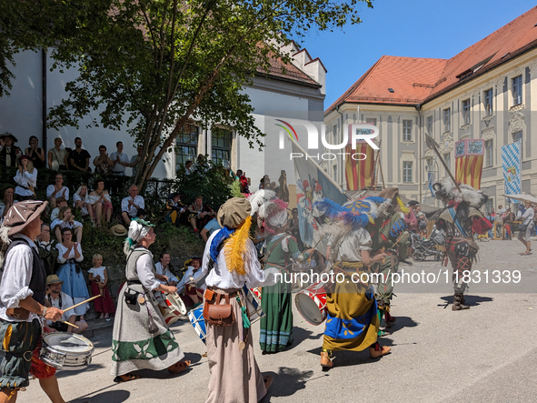 In Neuburg an der Donau, Germany, on July 9, 2023, the city hosts a grand historical parade as part of its annual castle festival. Around 2,...