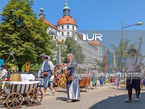 In Neuburg an der Donau, Germany, on July 9, 2023, the city hosts a grand historical parade as part of its annual castle festival. Around 2,...