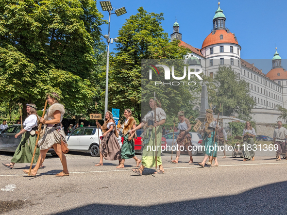 In Neuburg an der Donau, Germany, on July 9, 2023, the city hosts a grand historical parade as part of its annual castle festival. Around 2,...