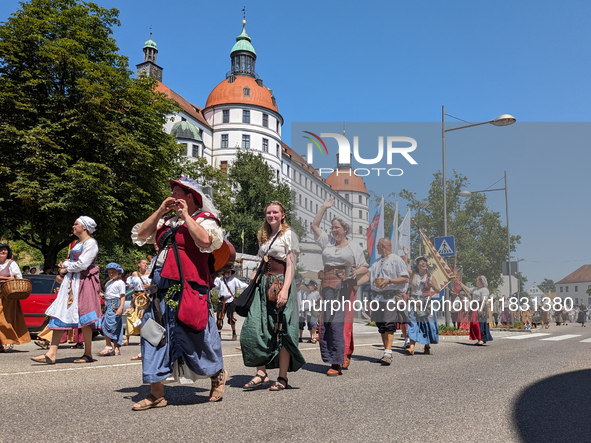 In Neuburg an der Donau, Germany, on July 9, 2023, the city hosts a grand historical parade as part of its annual castle festival. Around 2,...