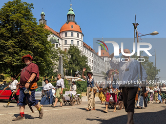 In Neuburg an der Donau, Germany, on July 9, 2023, the city hosts a grand historical parade as part of its annual castle festival. Around 2,...