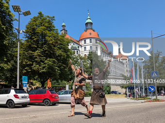 In Neuburg an der Donau, Germany, on July 9, 2023, the city hosts a grand historical parade as part of its annual castle festival. Around 2,...