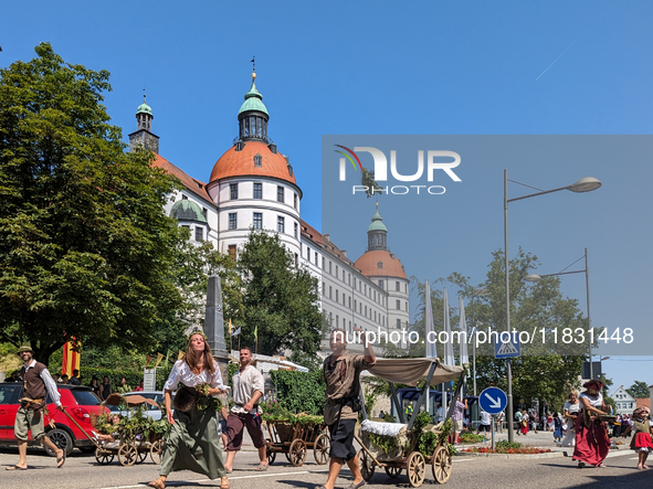 In Neuburg an der Donau, Germany, on July 9, 2023, the city hosts a grand historical parade as part of its annual castle festival. Around 2,...