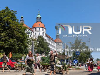 In Neuburg an der Donau, Germany, on July 9, 2023, the city hosts a grand historical parade as part of its annual castle festival. Around 2,...