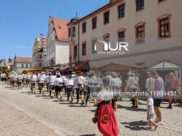 In Neuburg an der Donau, Germany, on July 9, 2023, the city hosts a grand historical parade as part of its annual castle festival. Around 2,...