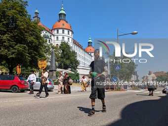 In Neuburg an der Donau, Germany, on July 9, 2023, the city hosts a grand historical parade as part of its annual castle festival. Around 2,...