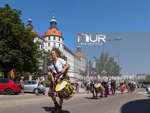 In Neuburg an der Donau, Germany, on July 9, 2023, the city hosts a grand historical parade as part of its annual castle festival. Around 2,...