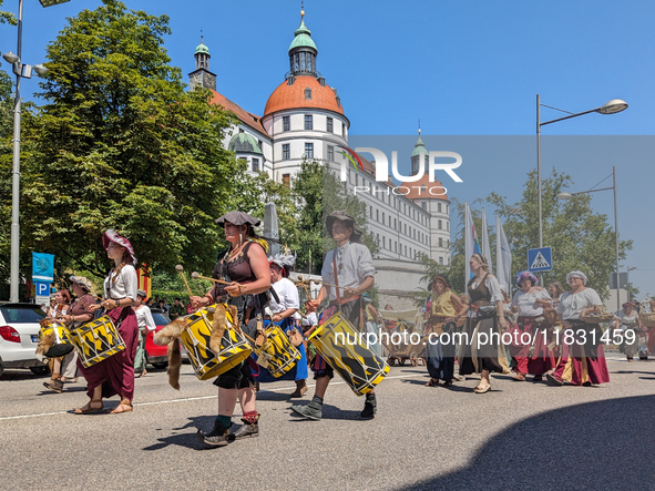 In Neuburg an der Donau, Germany, on July 9, 2023, the city hosts a grand historical parade as part of its annual castle festival. Around 2,...