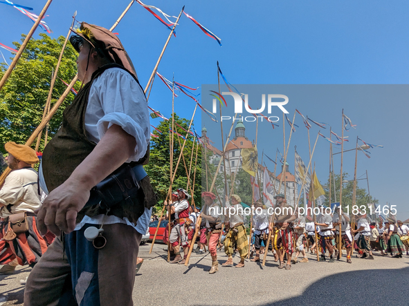 In Neuburg an der Donau, Germany, on July 9, 2023, the city hosts a grand historical parade as part of its annual castle festival. Around 2,...