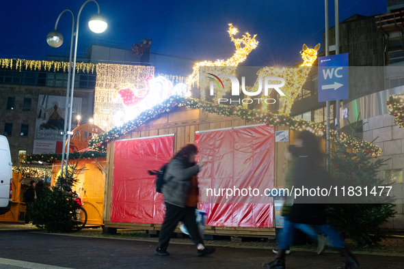 A general view shows the closed Bochum Christmas market in Bochum, Germany, on December 3, 2024, as several large anti-terror vehicle barrie...