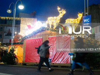 A general view shows the closed Bochum Christmas market in Bochum, Germany, on December 3, 2024, as several large anti-terror vehicle barrie...