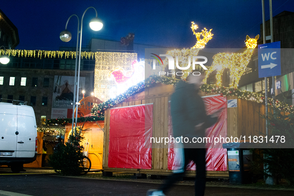 A general view shows the closed Bochum Christmas market in Bochum, Germany, on December 3, 2024, as several large anti-terror vehicle barrie...