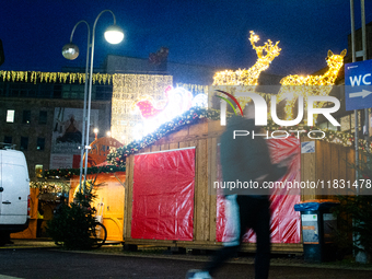 A general view shows the closed Bochum Christmas market in Bochum, Germany, on December 3, 2024, as several large anti-terror vehicle barrie...