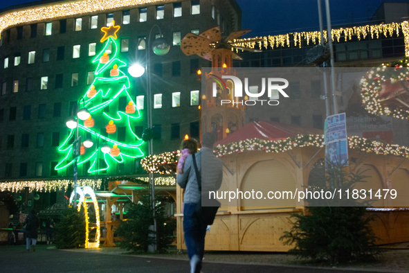 A general view shows the closed Bochum Christmas market in Bochum, Germany, on December 3, 2024, as several large anti-terror vehicle barrie...