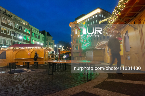 A general view shows the closed Bochum Christmas market in Bochum, Germany, on December 3, 2024, as several large anti-terror vehicle barrie...