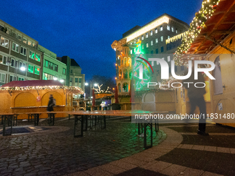 A general view shows the closed Bochum Christmas market in Bochum, Germany, on December 3, 2024, as several large anti-terror vehicle barrie...