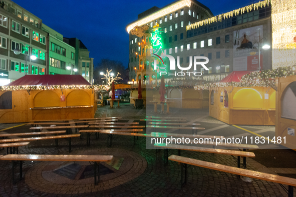 A general view shows the closed Bochum Christmas market in Bochum, Germany, on December 3, 2024, as several large anti-terror vehicle barrie...