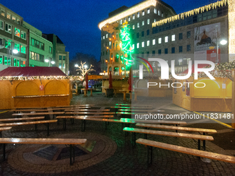 A general view shows the closed Bochum Christmas market in Bochum, Germany, on December 3, 2024, as several large anti-terror vehicle barrie...