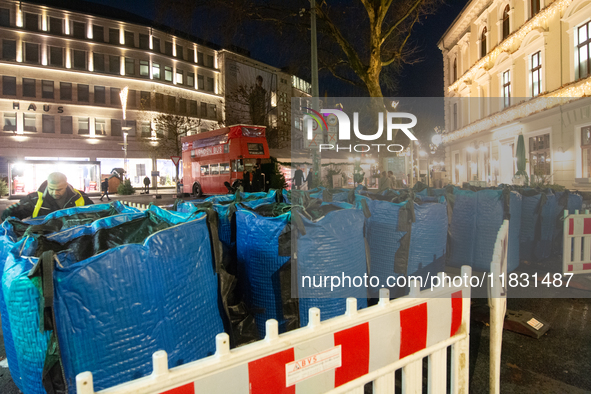 The barriers are seen as closed at the Bochum Christmas market in Bochum, Germany, on December 3, 2024, as several large anti-terror vehicle...