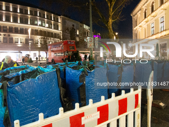 The barriers are seen as closed at the Bochum Christmas market in Bochum, Germany, on December 3, 2024, as several large anti-terror vehicle...