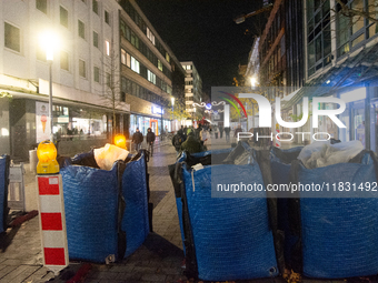 The barriers are seen as closed at the Bochum Christmas market in Bochum, Germany, on December 3, 2024, as several large anti-terror vehicle...